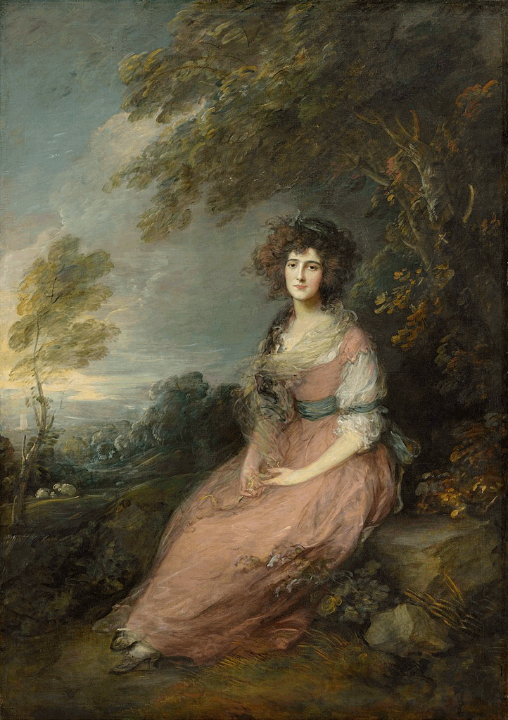 Woman in pinkish dress seated under tree