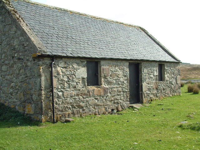 Exterior of small stone cottage