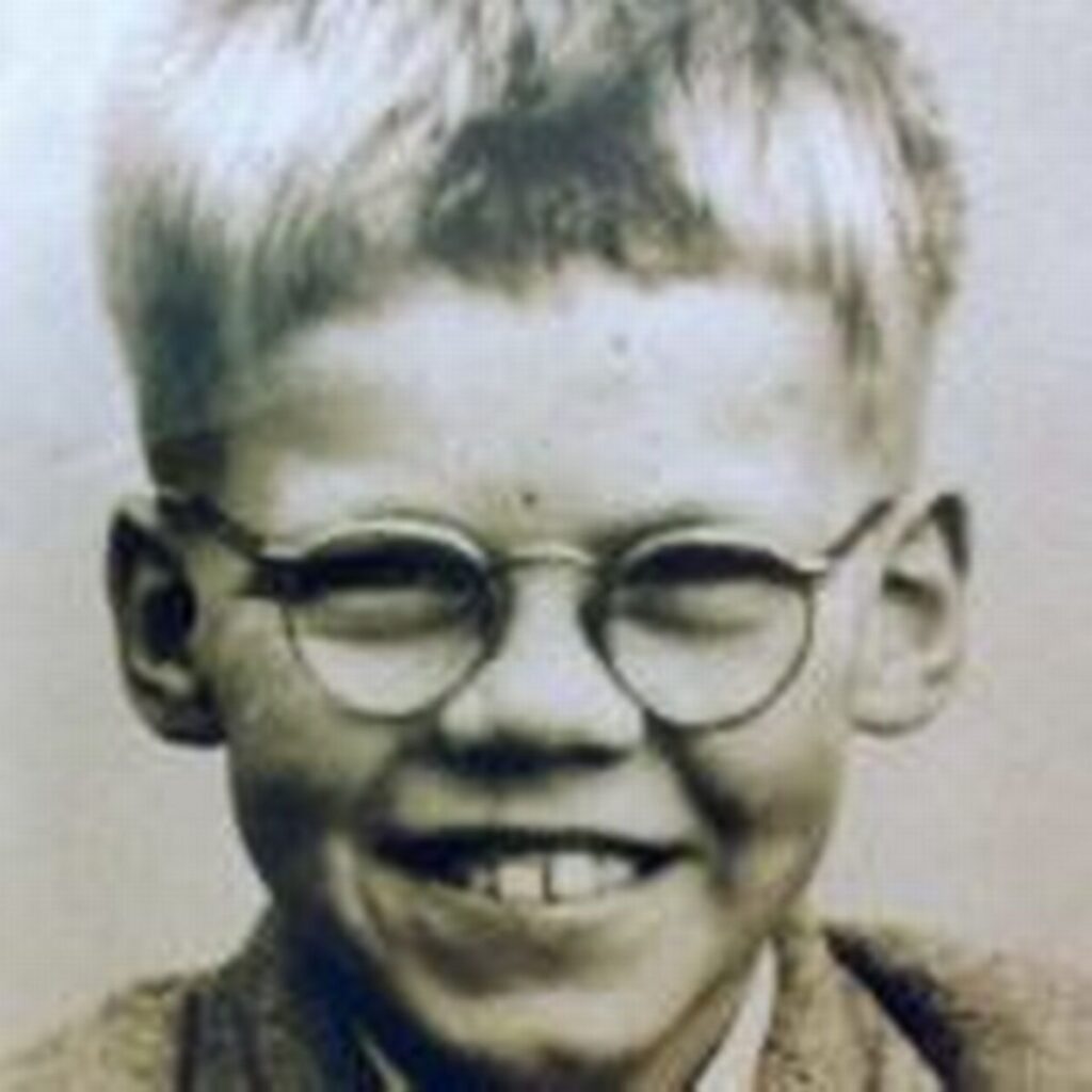 Young boy wearing spectacles